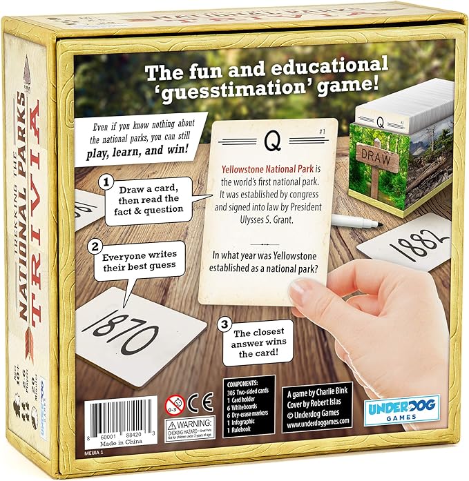 A hand holding a 'Trekking the National Parks Trivia' card game.